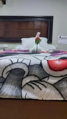 Deluxe Üç Kişilik Oda, Bahçe Manzaralı