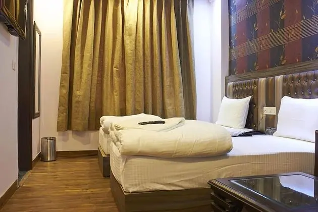Deluxe Tek Büyük veya İki Ayrı Yataklı Oda