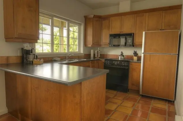 Standard One Bedroom Queen Suite with Sofa Bed, Full Kitchen and Harbor View