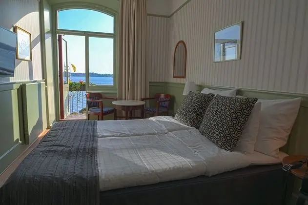 Tek Büyük veya İki Ayrı Yataklı Oda, Balkon, Okyanus Manzaralı