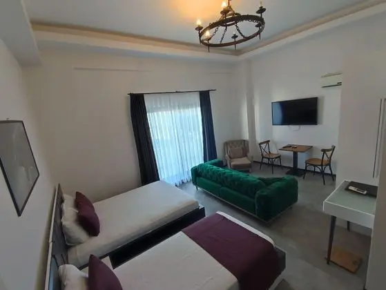 Deluxe Dört Kişilik Oda