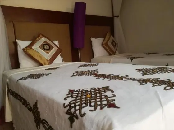 Deluxe Tek Büyük veya İki Ayrı Yataklı Oda