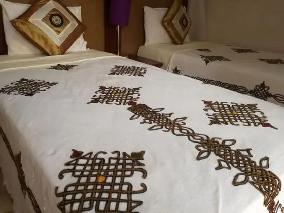 Deluxe Tek Büyük veya İki Ayrı Yataklı Oda