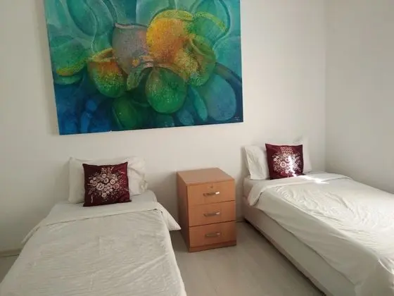 Deluxe Tek Büyük veya İki Ayrı Yataklı Oda