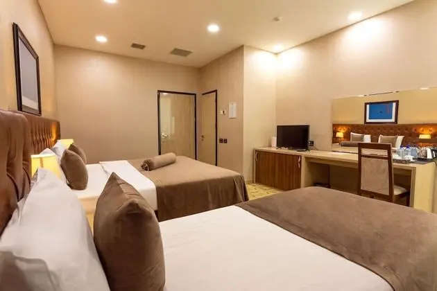 Deluxe Üç Kişilik Oda