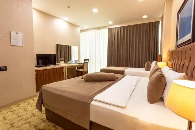 Deluxe Üç Kişilik Oda