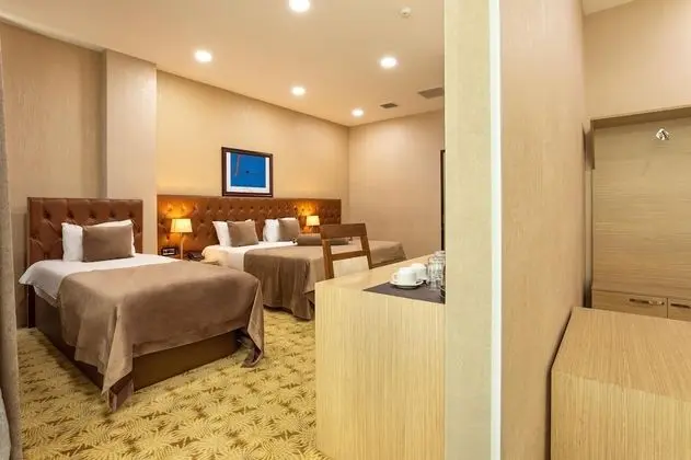 Deluxe Üç Kişilik Oda