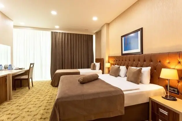 Deluxe Üç Kişilik Oda