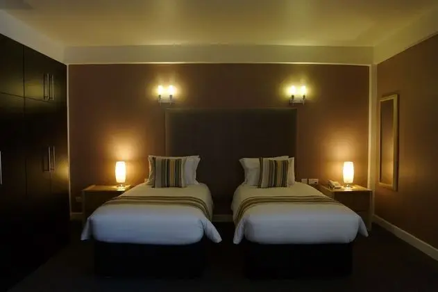 Deluxe Tek Büyük veya İki Ayrı Yataklı Oda, 1 Çift Kişilik Yatak, Banyolu/Duşlu, Bahçe Manzaralı