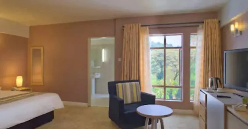 Deluxe Tek Büyük veya İki Ayrı Yataklı Oda, 1 Çift Kişilik Yatak, Banyolu/Duşlu, Bahçe Manzaralı