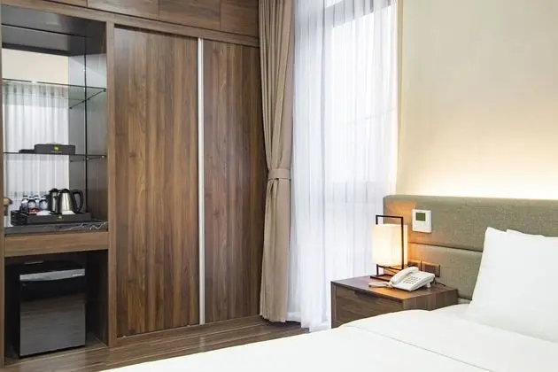 Deluxe Tek Büyük veya İki Ayrı Yataklı Oda