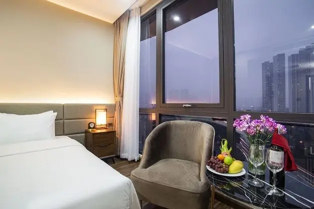 Deluxe Tek Büyük veya İki Ayrı Yataklı Oda