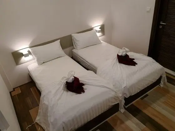 Deluxe Tek Büyük veya İki Ayrı Yataklı Oda