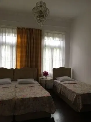 Economy Üç Kişilik Oda, Ortak Banyo