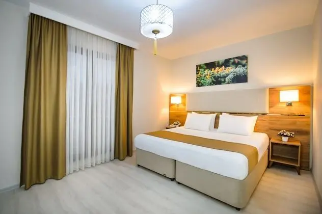 Comfort Tek Büyük veya İki Ayrı Yataklı Oda, Kısmi Deniz Manzaralı