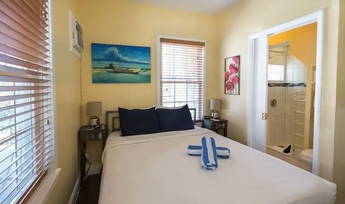 Small Queen Room at Olivia By Duval, 511 Olivia Street