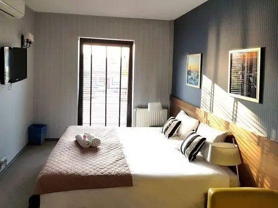 Deluxe Tek Büyük veya İki Ayrı Yataklı Oda