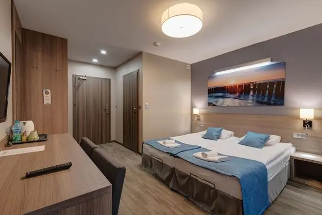 Comfort Tek Büyük veya İki Ayrı Yataklı Oda