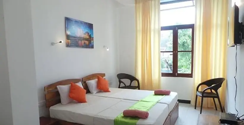 Standard Üç Kişilik Oda, Bahçe Manzaralı