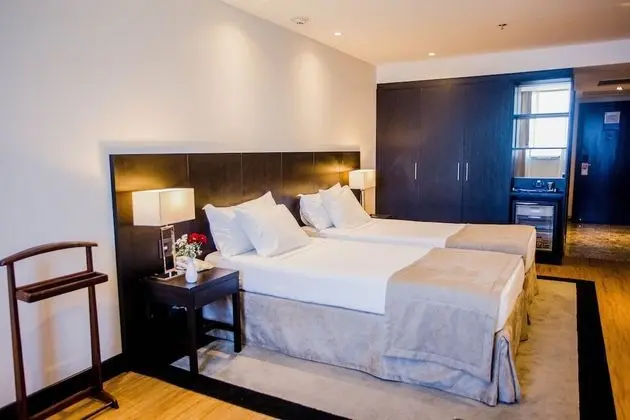 Luxo Plus com 2 Camas de Solteiro
