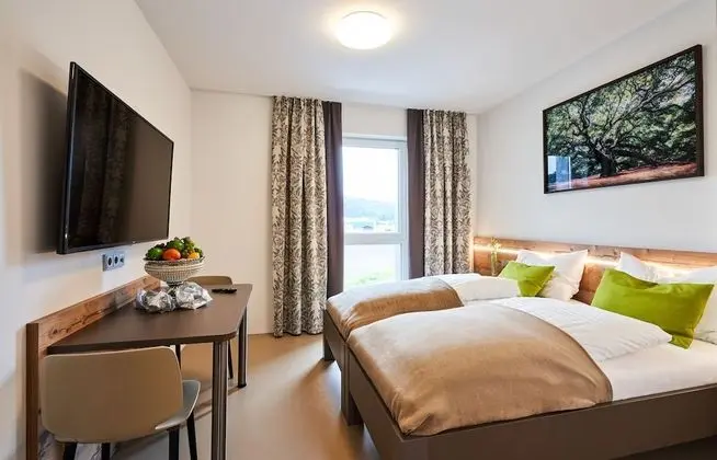 Business Tek Büyük veya İki Ayrı Yataklı Oda