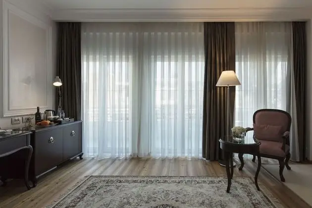 Deluxe Tek Büyük veya İki Ayrı Yataklı Oda