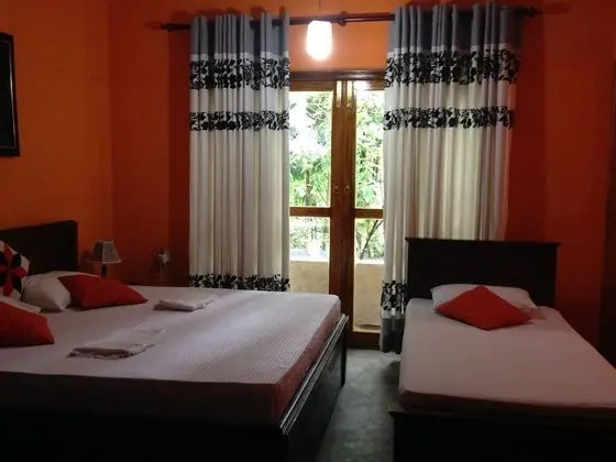 Deluxe Üç Kişilik Oda, Bahçe Manzaralı