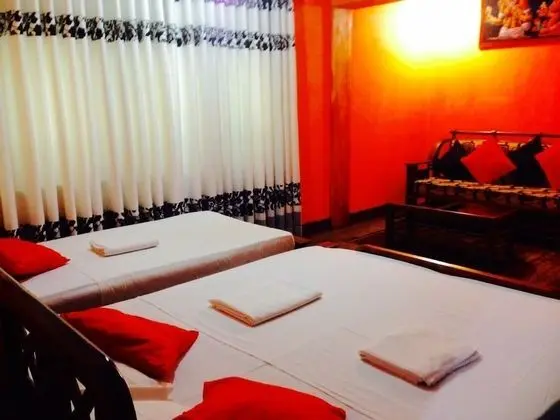 Deluxe Üç Kişilik Oda, Bahçe Manzaralı