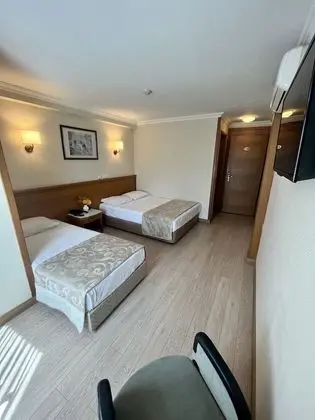 Üç Kişilik Oda