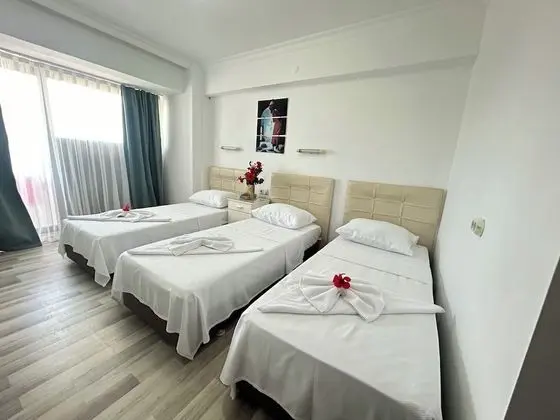 Üç Kişilik Oda