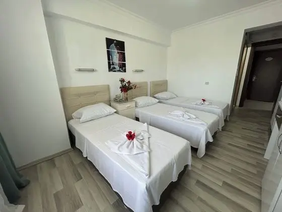 Üç Kişilik Oda