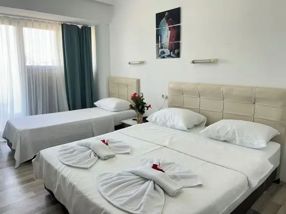 Üç Kişilik Oda