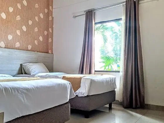 Deluxe Tek Büyük veya İki Ayrı Yataklı Oda