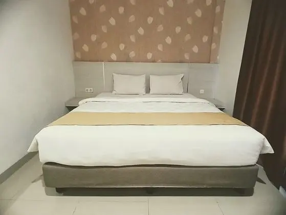 Deluxe Tek Büyük veya İki Ayrı Yataklı Oda