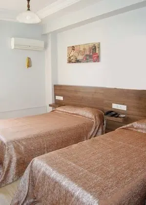 Economy Üç Kişilik Oda