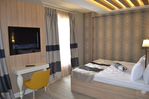 Deluxe Tek Büyük Yataklı Oda, Sigara İçilebilir