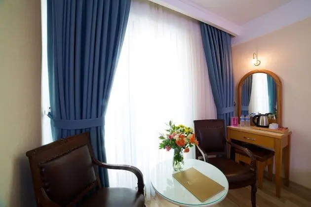 Üç Kişilik Oda