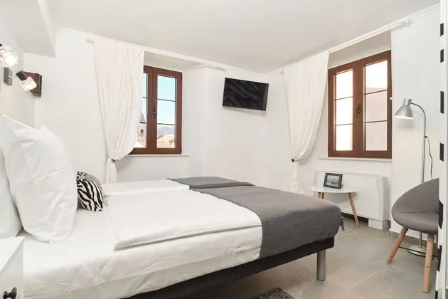 Deluxe Tek Büyük veya İki Ayrı Yataklı Oda