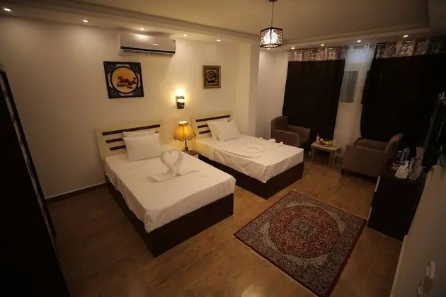 Deluxe Tek Büyük veya İki Ayrı Yataklı Oda