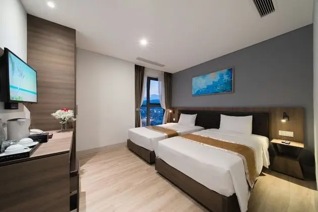 Deluxe Tek Büyük veya İki Ayrı Yataklı Oda