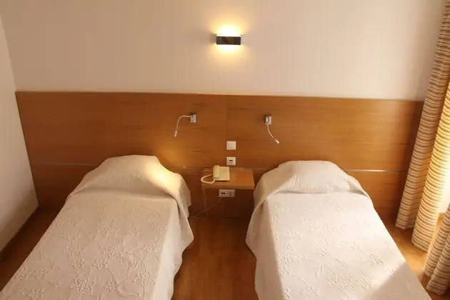 City Tek Büyük veya İki Ayrı Yataklı Oda