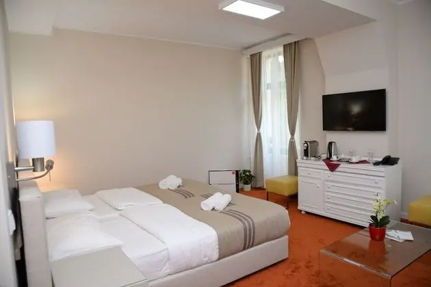 Deluxe Tek Büyük veya İki Ayrı Yataklı Oda