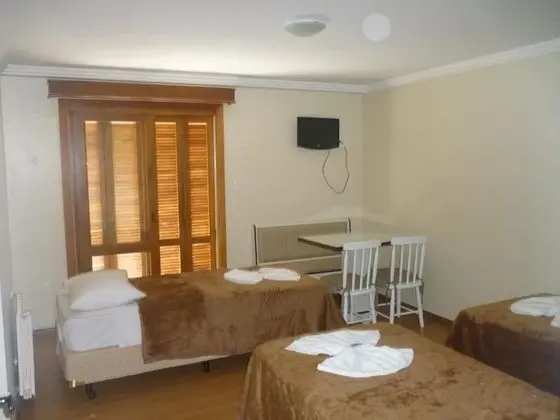 Deluxe Üç Kişilik Oda