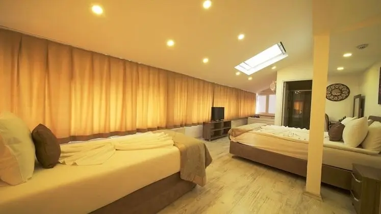 Deluxe Üç Kişilik Oda