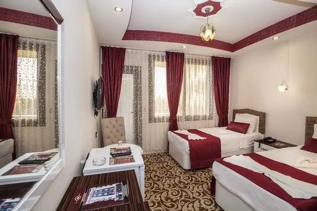 Üç Kişilik Oda