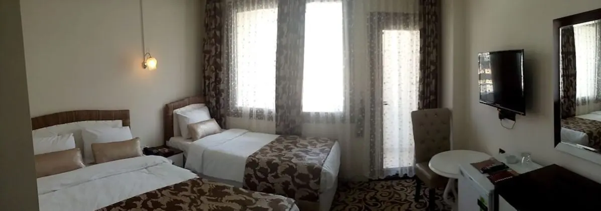 Üç Kişilik Oda