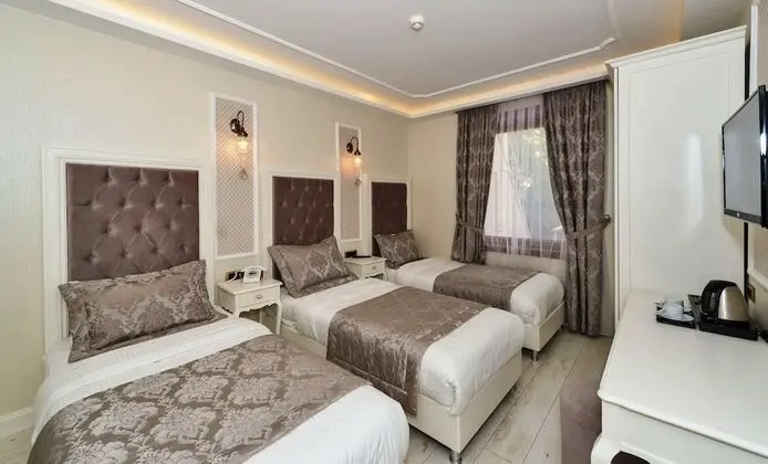 Üç Kişilik Oda