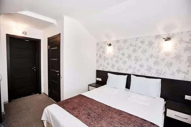 Deluxe Tek Büyük veya İki Ayrı Yataklı Oda