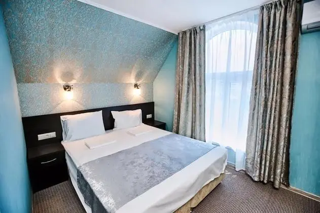 Deluxe Tek Büyük veya İki Ayrı Yataklı Oda