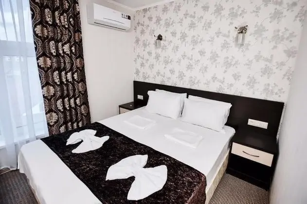 Deluxe Tek Büyük veya İki Ayrı Yataklı Oda